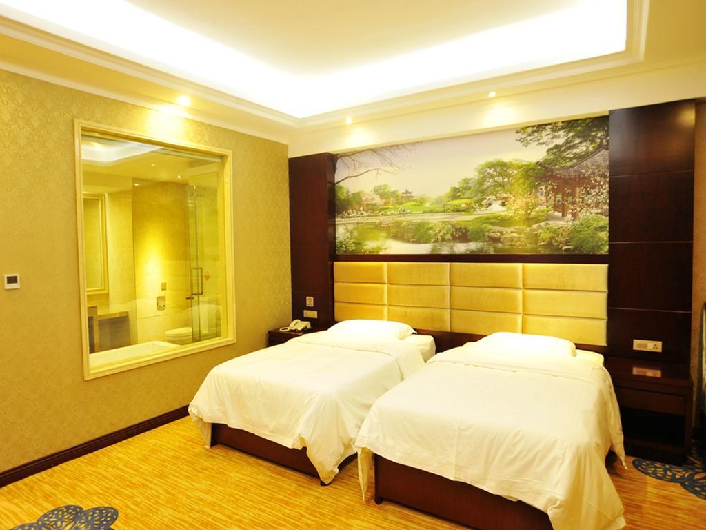 New West Street Hotel - Grand Wing يانغتشو الغرفة الصورة