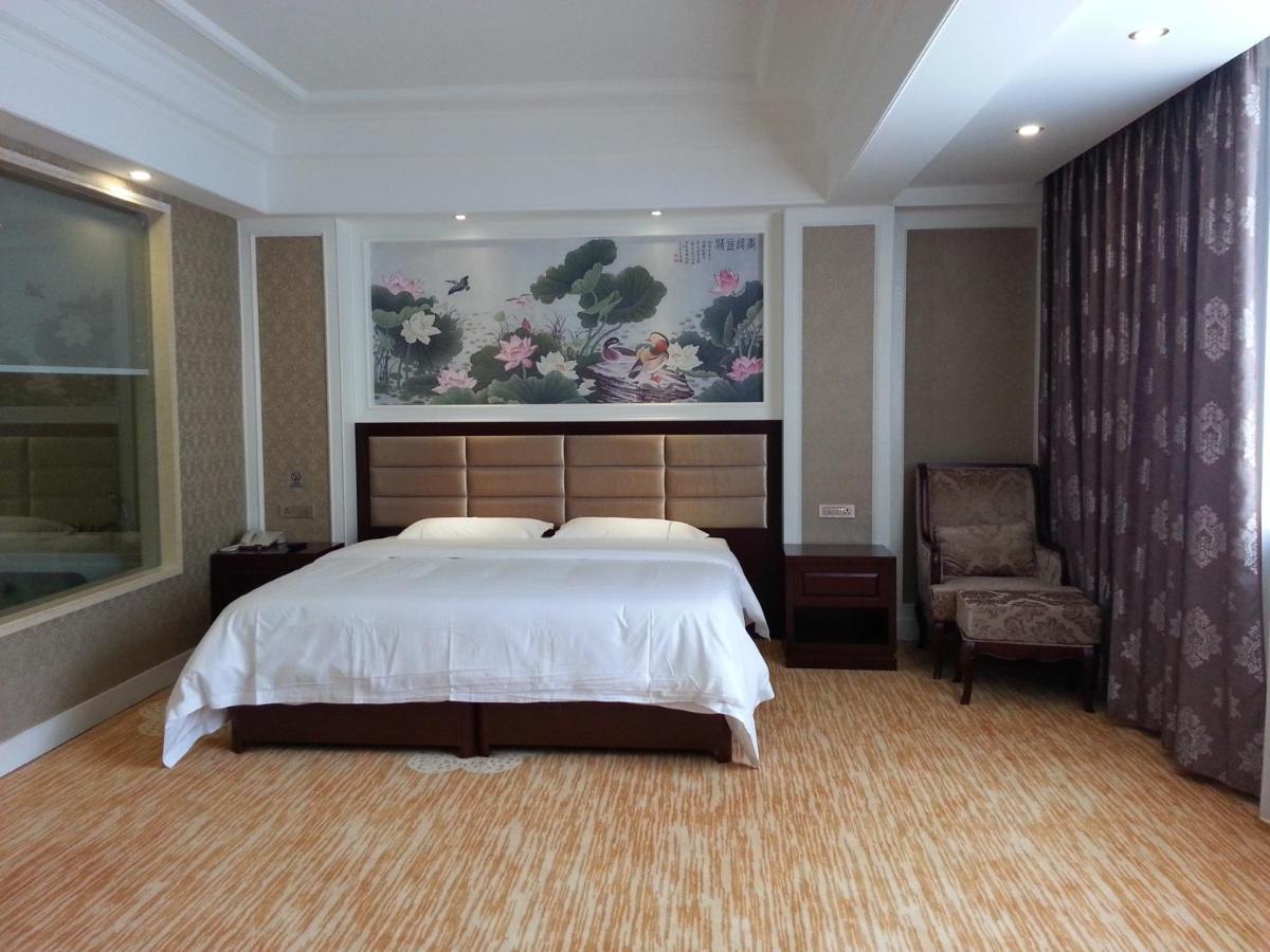 New West Street Hotel - Grand Wing يانغتشو الغرفة الصورة