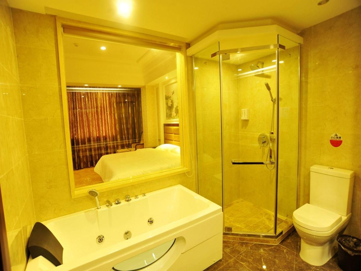 New West Street Hotel - Grand Wing يانغتشو الغرفة الصورة
