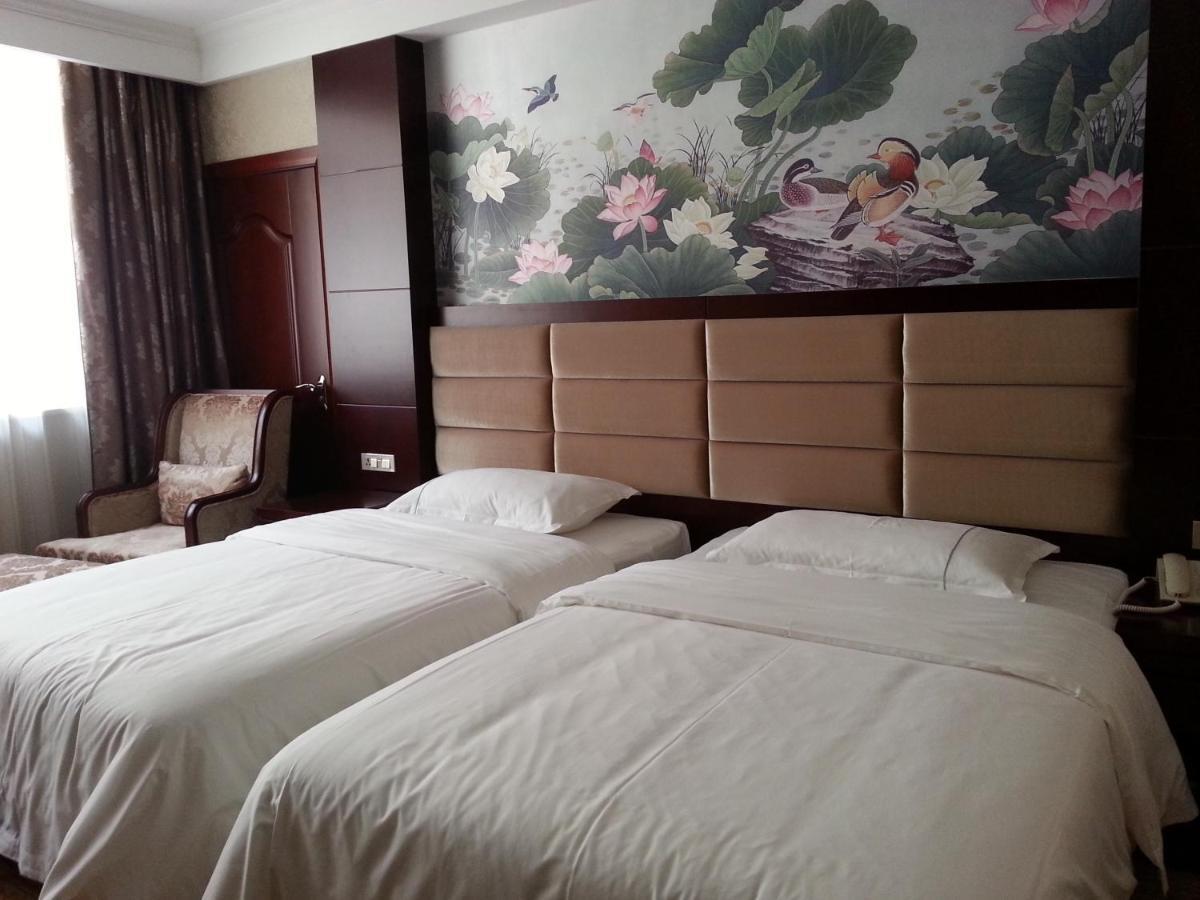 New West Street Hotel - Grand Wing يانغتشو الغرفة الصورة