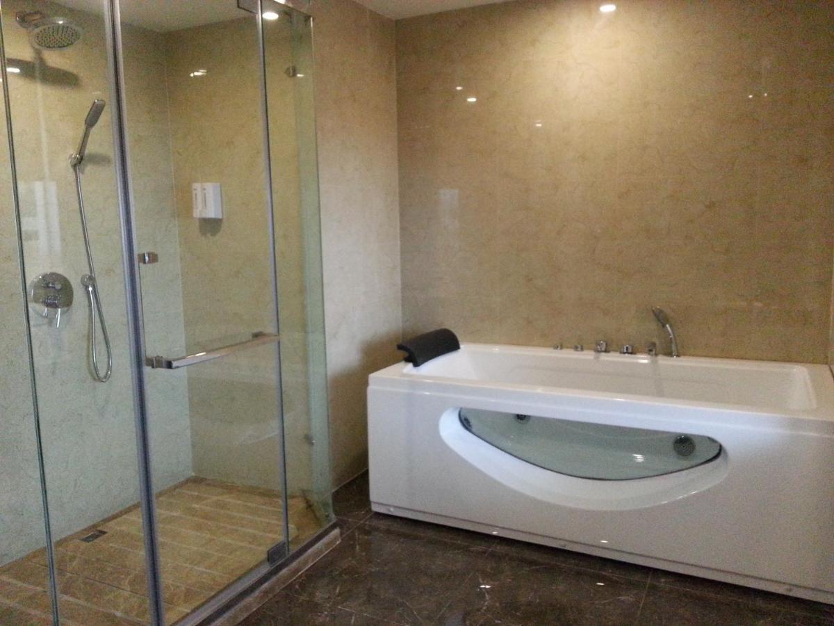 New West Street Hotel - Grand Wing يانغتشو الغرفة الصورة