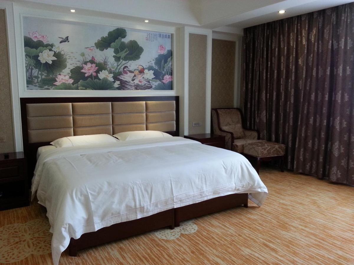 New West Street Hotel - Grand Wing يانغتشو الغرفة الصورة