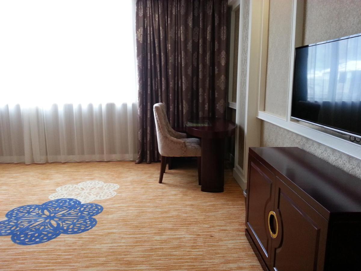 New West Street Hotel - Grand Wing يانغتشو الغرفة الصورة